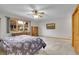 Large main bedroom showcasing natural light, carpet floors and neutral paint at 2616 E Egbert St, Brighton, CO 80601