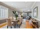 Open-concept dining area seamlessly flowing into the living room space at 2541 Cherry St, Denver, CO 80207