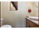 Bathroom features a vessel sink, wood cabinet, and neutral color palette at 167 Independence Cir, Breckenridge, CO 80424