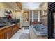 Beautiful bathroom displays a soaking tub, double sinks, wood cabinets, and tile flooring at 167 Independence Cir, Breckenridge, CO 80424