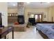 Bedroom boasts a fireplace, jacuzzi tub, and sliding glass doors to deck at 167 Independence Cir, Breckenridge, CO 80424