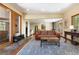 Cozy living room featuring an area rug, wood floors, and natural light at 167 Independence Cir, Breckenridge, CO 80424