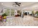 Spacious living room features an open floor plan, large windows, and sleek tile floors at 167 Independence Cir, Breckenridge, CO 80424