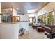 Bedroom showcasing a sitting area, ensuite bath, and large windows providing ample natural light at 167 Independence Cir, Breckenridge, CO 80424