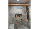 Modern shower with stylish tile, multiple showerheads, and built-in shelves for bath products at 1473 S Monaco S Pkwy, Denver, CO 80224