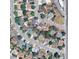 Aerial view of a residential neighborhood showcasing the property's location within the community and nearby amenities at 8319 Quivas Way, Denver, CO 80221