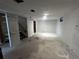 Unfinished basement with exposed ceiling and walls providing ample space for storage or renovation at 8319 Quivas Way, Denver, CO 80221