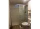 Compact bathroom with glass enclosed shower at 8319 Quivas Way, Denver, CO 80221