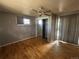 Spacious bedroom with natural light, closet, and sliding glass door at 8319 Quivas Way, Denver, CO 80221