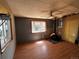 Inviting living room boasting a bay window, decorative fireplace, and wood flooring at 8319 Quivas Way, Denver, CO 80221
