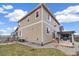 The backyard features a pergola, small patio, and lawn, offering a private outdoor space at 10913 Ledges Rd, Parker, CO 80134
