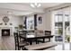 Elegant dining area with a fireplace and sliding glass doors leading to the backyard at 10913 Ledges Rd, Parker, CO 80134