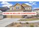 Inviting two-story home with a three-car garage and well-maintained front yard at 10913 Ledges Rd, Parker, CO 80134