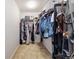 Spacious walk-in closet with shelving, rods, and ample storage space for clothes and accessories at 10913 Ledges Rd, Parker, CO 80134