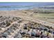 Scenic aerial view showcasing the neighborhood near a lake and highway at 8888 S Dudley St, Littleton, CO 80128