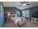 Tranquil main bedroom with vaulted ceiling, a ceiling fan, a TV, and natural light at 8888 S Dudley St, Littleton, CO 80128
