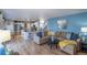 Open concept living area with stainless steel appliances, eat-in kitchen, and lots of natural light at 8888 S Dudley St, Littleton, CO 80128