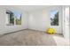 Bright and airy bedroom with two large windows and whimsical decor at 14 S Grape St, Denver, CO 80246