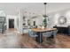Bright dining room features modern lighting, stylish decor, and seamless access to the kitchen at 14 S Grape St, Denver, CO 80246