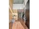 Bright foyer with modern design, beautiful wood floors, and an open staircase at 14 S Grape St, Denver, CO 80246