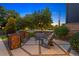 Inviting front yard seating area with landscaping, hardscaping, and attractive design elements at 14 S Grape St, Denver, CO 80246