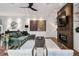 Cozy living room with fireplace and large windows offers a relaxing space at 14 S Grape St, Denver, CO 80246