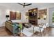 Inviting living room boasts a stone fireplace, built-in shelving, and cozy seating at 14 S Grape St, Denver, CO 80246