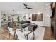 Open floor plan with modern decor, connecting the living, dining, and kitchen areas at 14 S Grape St, Denver, CO 80246
