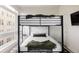 Bedroom with bunk beds, modern decor, and bright light coming through the windows at 2880 Zuni St # 308, Denver, CO 80211