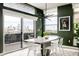 Modern dining room with city views, sleek lighting, and an elegant table setting at 2880 Zuni St # 308, Denver, CO 80211