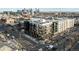Modern apartment building with unique facade, city skyline, and street view at 2880 Zuni St # 308, Denver, CO 80211