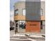 Jacques restaurant with brick and modern metal facade at 2880 Zuni St # 308, Denver, CO 80211