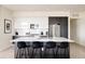 Contemporary kitchen with a large island, modern appliances, and sleek cabinetry at 2880 Zuni St # 308, Denver, CO 80211