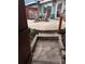 Inviting back patio with flagstone, mature landscaping, and seating area at 9060 E Cherry Creek South Dr # E, Denver, CO 80231