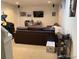 Basement rec room with a leather couch, TV and home theater system at 9060 E Cherry Creek South Dr # E, Denver, CO 80231
