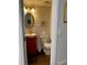 Compact powder room featuring a vessel sink and modern fixtures at 9060 E Cherry Creek South Dr # E, Denver, CO 80231
