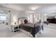 Inviting bedroom with a mirrored closet and bedroom-to-bathroom view at 9060 E Cherry Creek South Dr # E, Denver, CO 80231
