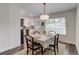 Bright dining area with an elegant table setting and natural light at 9060 E Cherry Creek South Dr # E, Denver, CO 80231
