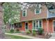 Brick townhome exterior with bay window at 9060 E Cherry Creek South Dr # E, Denver, CO 80231