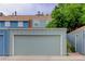 Exterior view of the garage featuring a well-maintained facade, and convenient access to the home at 9060 E Cherry Creek South Dr # E, Denver, CO 80231