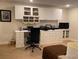 Well-appointed home office with custom built-ins and ample storage at 9060 E Cherry Creek South Dr # E, Denver, CO 80231
