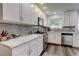 Modern kitchen with subway tile backsplash, granite countertops and stainless-steel appliances at 9060 E Cherry Creek South Dr # E, Denver, CO 80231
