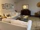Inviting living room with a cozy white sofa and a decorative rug at 9060 E Cherry Creek South Dr # E, Denver, CO 80231