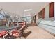Spacious covered patio with comfortable seating arrangements perfect for outdoor entertaining and relaxation at 16308 E Wyoming Dr, Aurora, CO 80017