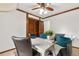 Warm office area with a desk set for work, and exposed beams for a cozy workspace at 16308 E Wyoming Dr, Aurora, CO 80017