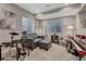 Finished basement with music area including instruments and seating at 11796 Edenfeld St, Parker, CO 80134