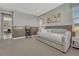 Stylish bedroom featuring a comfortable daybed, a decorative pillow, and soft natural light at 11796 Edenfeld St, Parker, CO 80134
