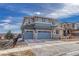 Inviting two-story home with a three-car garage and a basketball hoop in a Gathering-friendly neighborhood at 11796 Edenfeld St, Parker, CO 80134