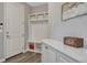 Functional mudroom with built-in storage, cubbies, hooks, and a convenient drop zone for organizing at 11796 Edenfeld St, Parker, CO 80134