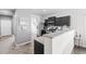 Kitchen features granite countertops and dark wood cabinets at 488 Vista Blvd, Brighton, CO 80603